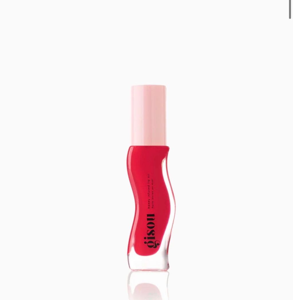 GISOU - A sheer, red lip oil with pink undertones and a fruity strawberry scent.