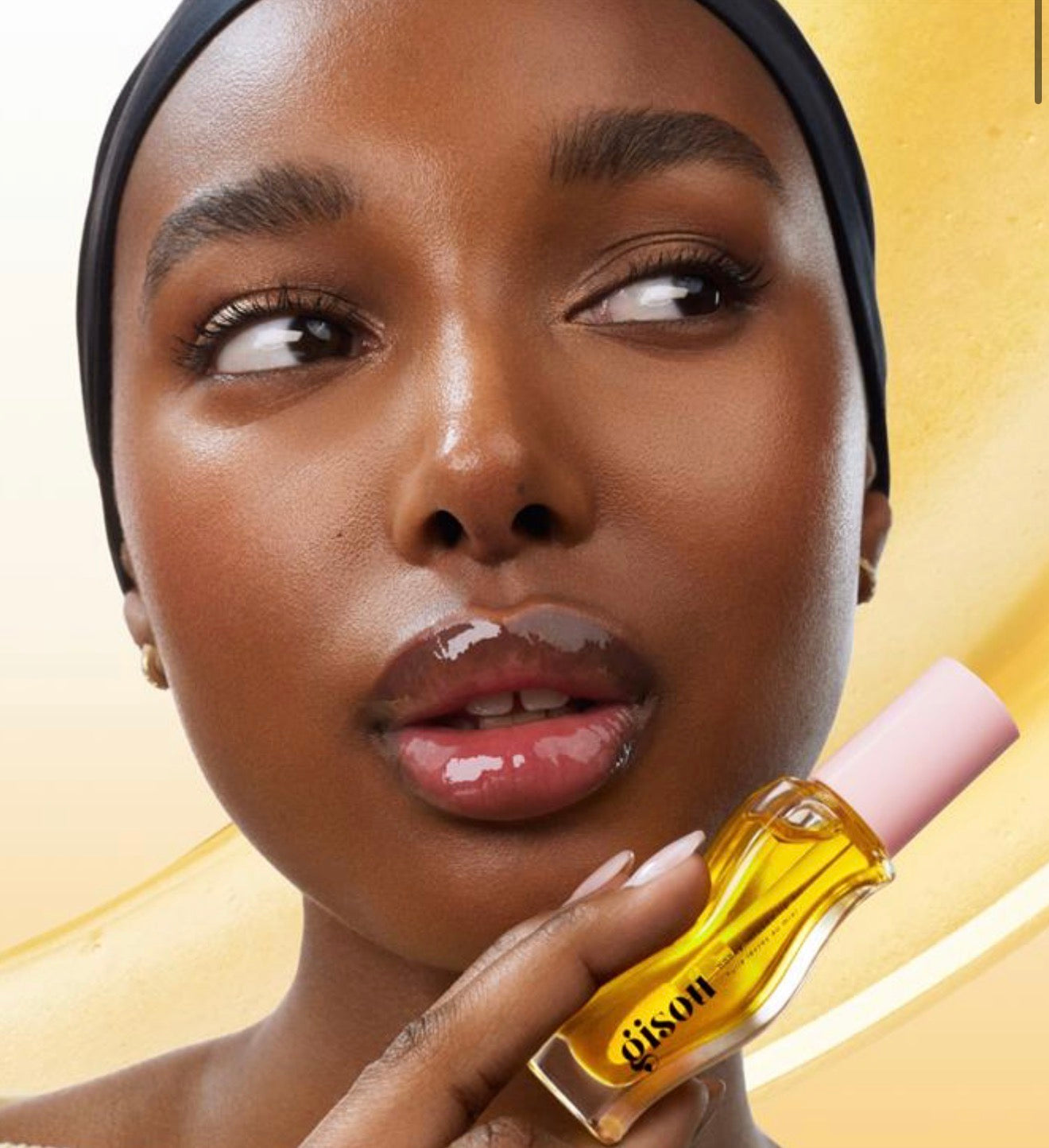 GISOU- A clear, golden lip oil inspired by honey from our Mirsalehi Bee Garden.