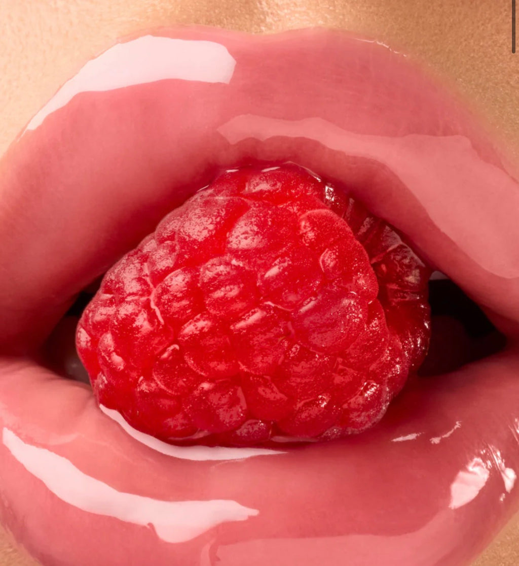 GISOU- A sheer pink lip oil with cool undertones and a sweet raspberry scent.