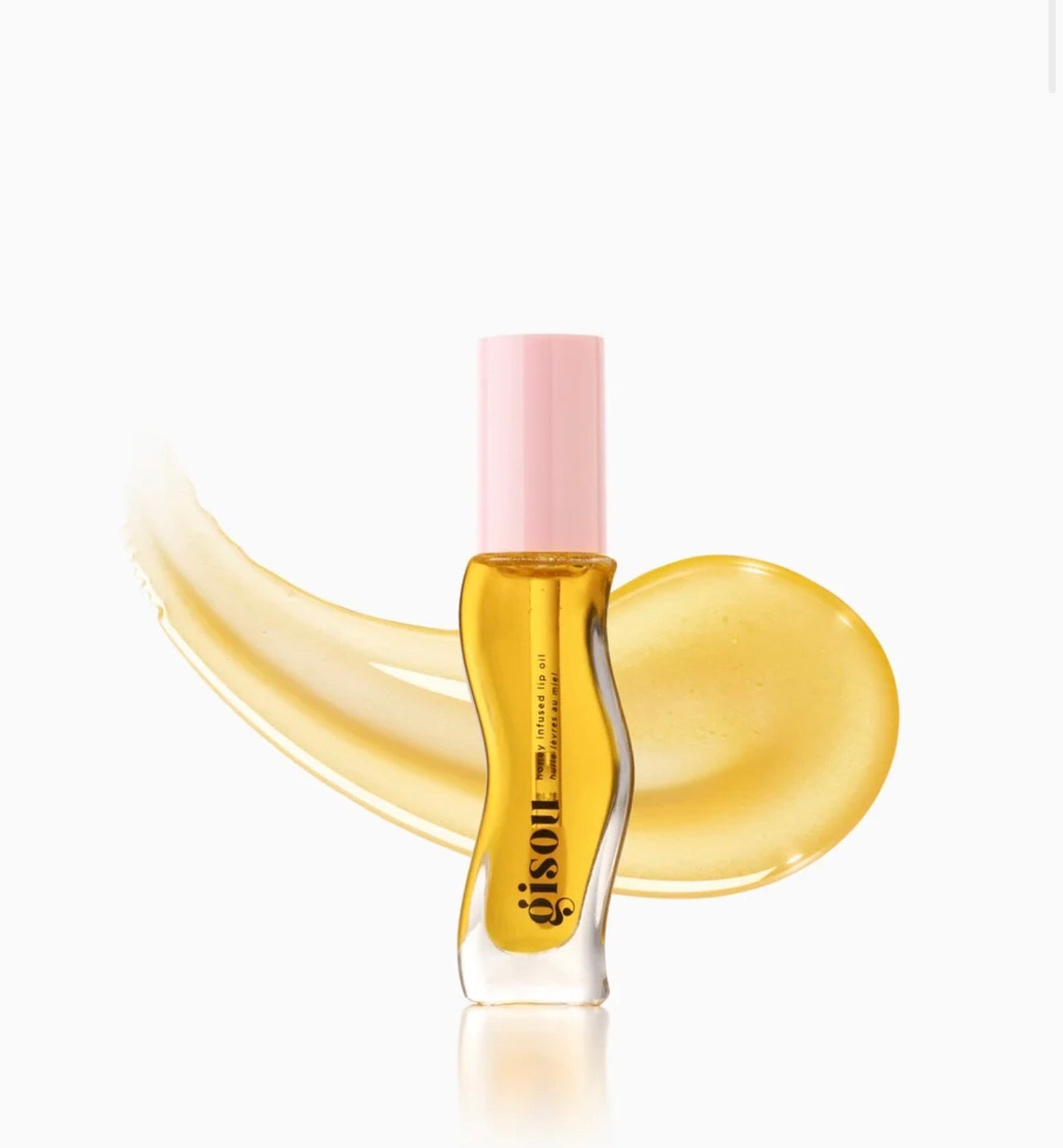 GISOU- A clear, golden lip oil inspired by honey from our Mirsalehi Bee Garden.