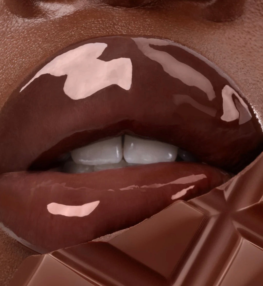 GISOU- A sheer-but-buildable milky brown with cool undertones, inspired by a fireside cup of mocha. Swipe on the tint and scent of chocolate espresso with a creamy top for lips that are intensely hydrated and boosted with glossy shine