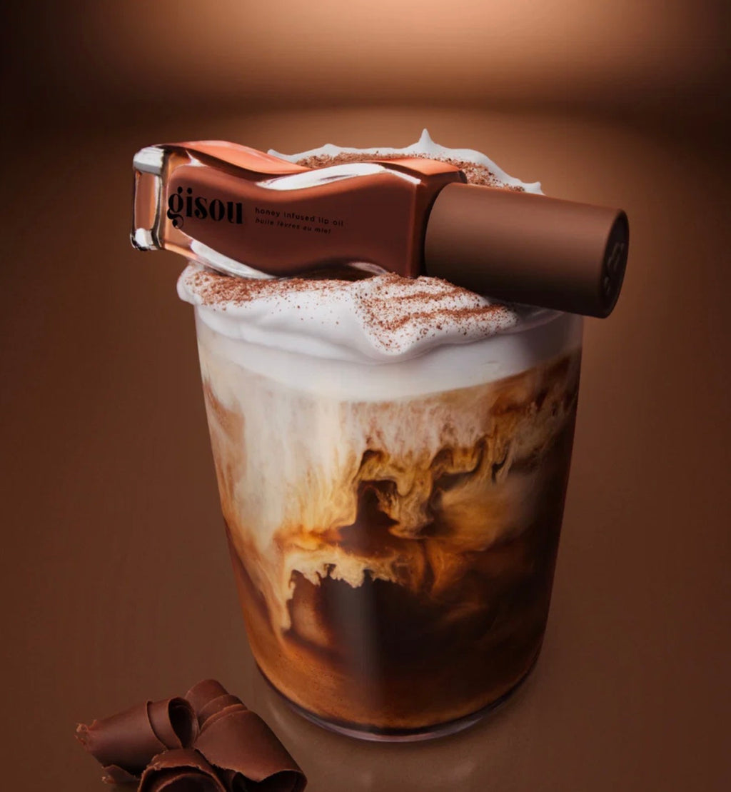 GISOU- A sheer-but-buildable milky brown with cool undertones, inspired by a fireside cup of mocha. Swipe on the tint and scent of chocolate espresso with a creamy top for lips that are intensely hydrated and boosted with glossy shine