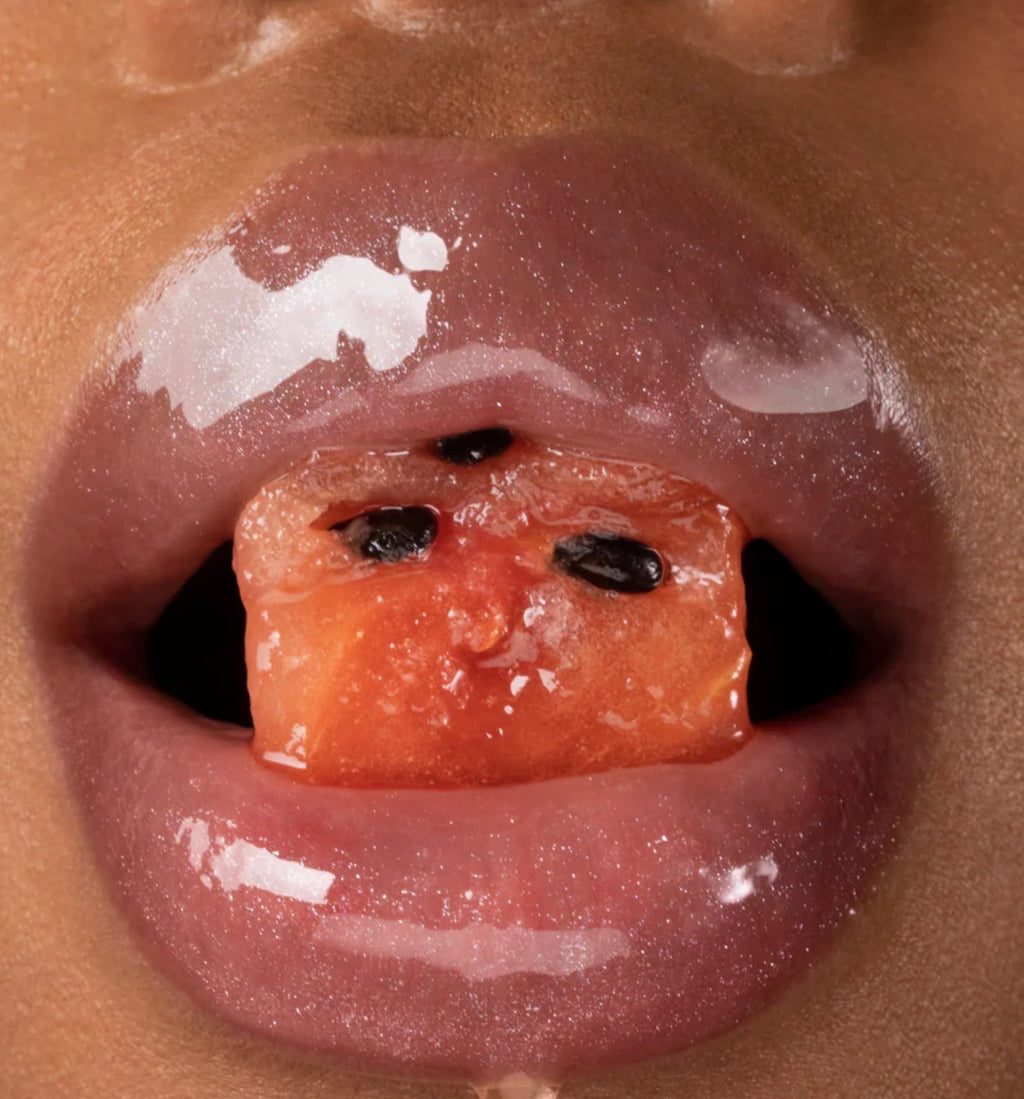 GISOU A shimmery, light pink lip oil with a sugary-sweet watermelon scent.