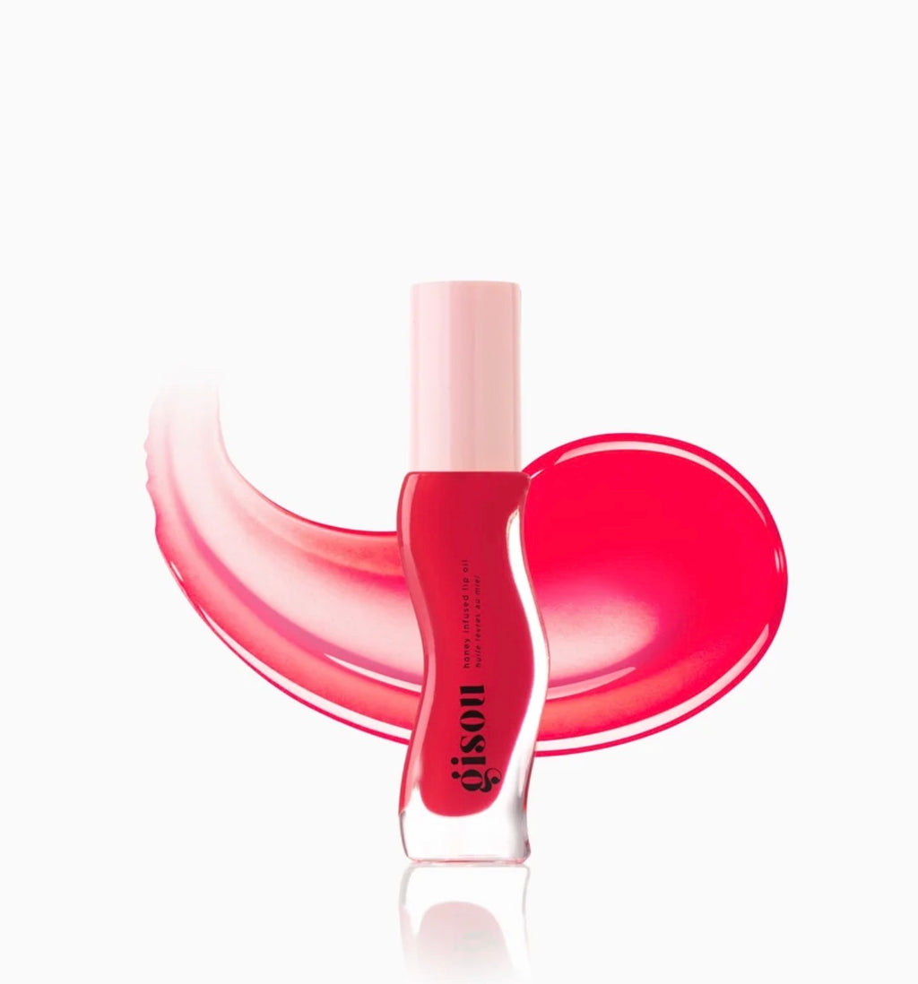 GISOU - A sheer, red lip oil with pink undertones and a fruity strawberry scent.