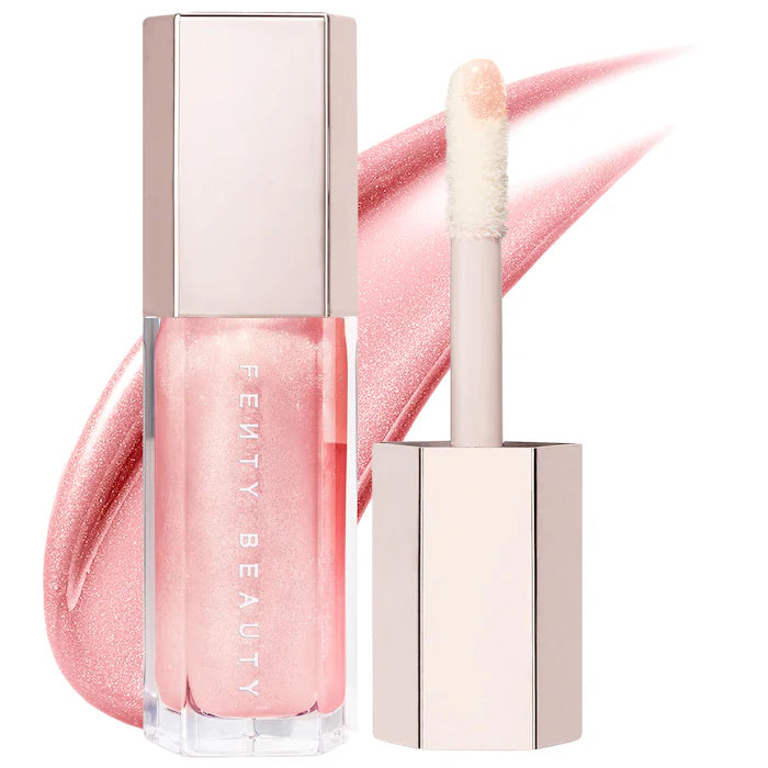 Fenty Beauty by Rihanna 
Gloss Bomb Universal Lip Gloss Luminizer Color: $weetmouth - shimmering soft pink