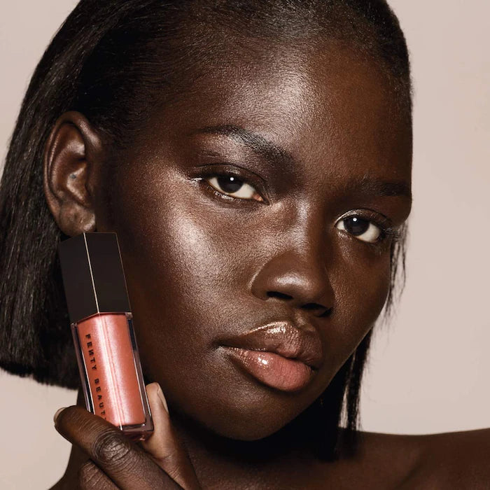 Fenty Beauty by Rihanna 
Gloss Bomb Universal Lip Gloss Luminizer Color: Fenty Glow - shimmering rose nude