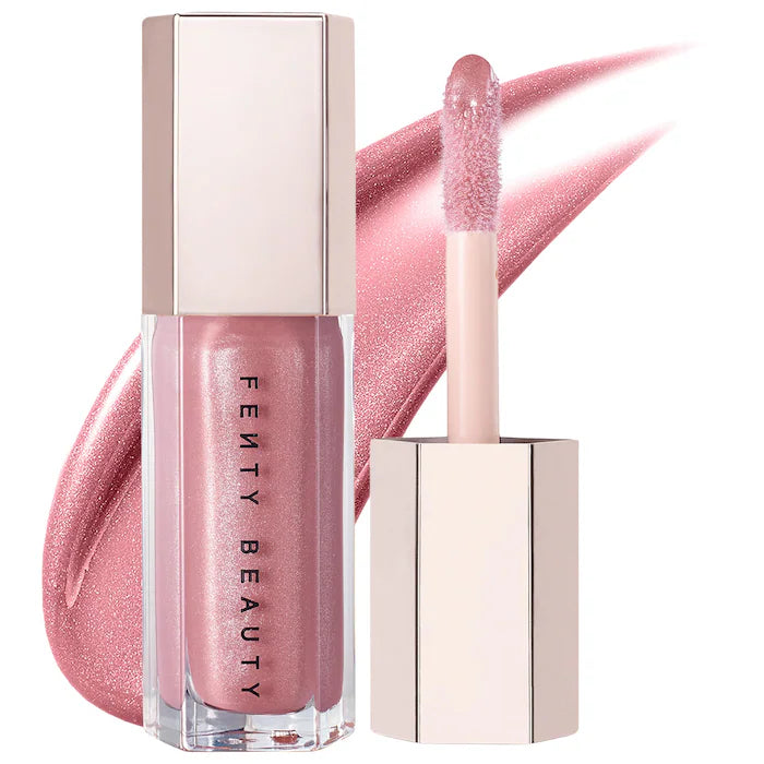 Fenty Beauty by Rihanna 
Gloss Bomb Universal Lip Gloss Luminizer Color: FU$$Y - shimmering pink