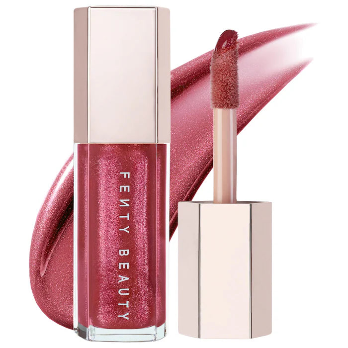 Fenty Beauty by Rihanna 
Gloss Bomb Universal Lip Gloss Luminizer Color: Riri - shimmering rose mauve nude