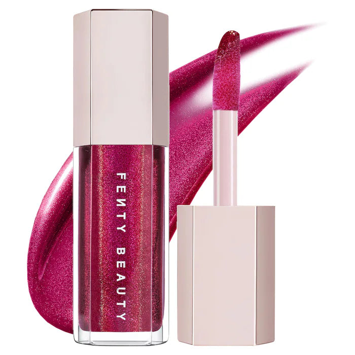 Fenty Beauty by Rihanna 
Gloss Bomb Universal Lip Gloss Luminizer Color: Fuchsia Flex - shimmering holographic deep fuchsia