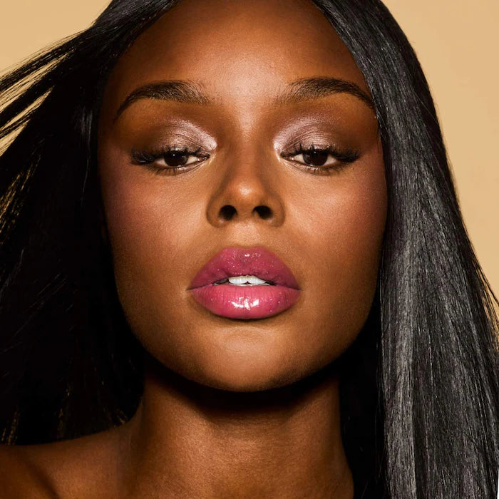 Fenty Beauty by Rihanna 
Gloss Bomb Oil Luminizing Lip Oil 'N Gloss Color: Razzberry Jamz - sparkling bright berry